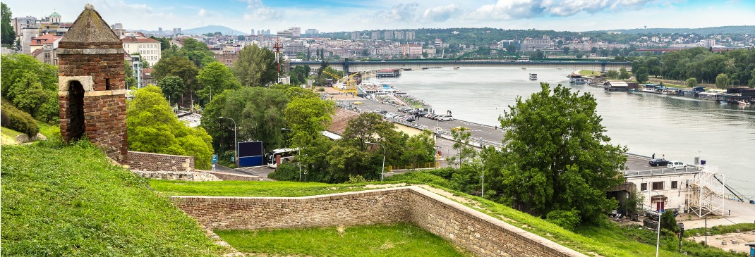 The Sava River in Belgrade, Serbia with lush green landscape